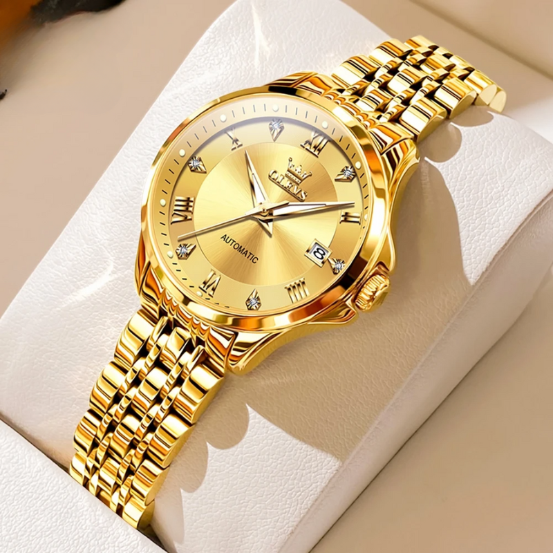 Montre Automatique Femme Dorée Waterproof 30mm posée sur son étui