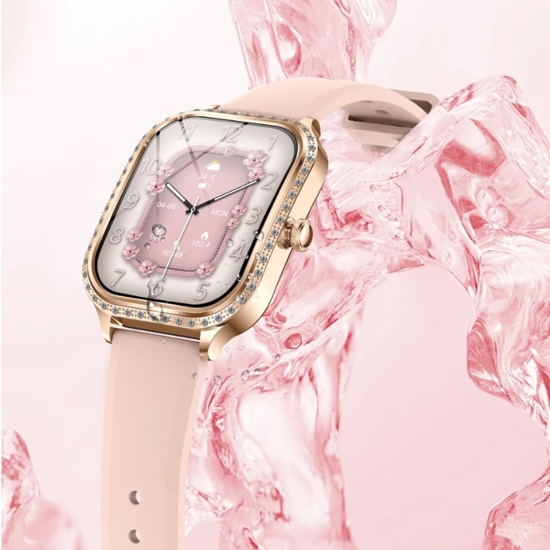 Montre Connectée Femme Cadran Rose Doré à Strass sur fond décoratif rose