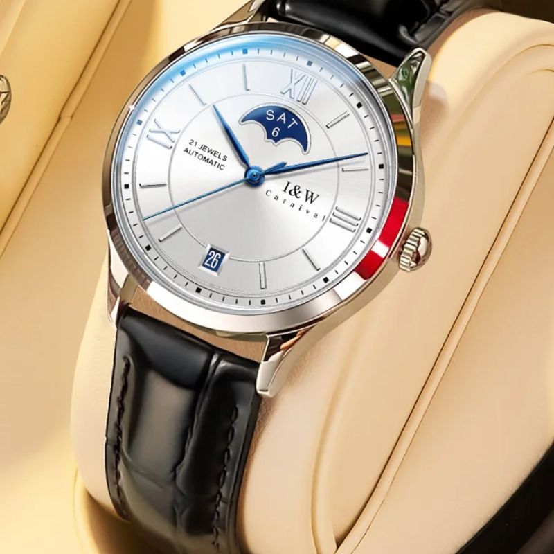 Montre automatique femme cadran argenté et bracelet cuir noir