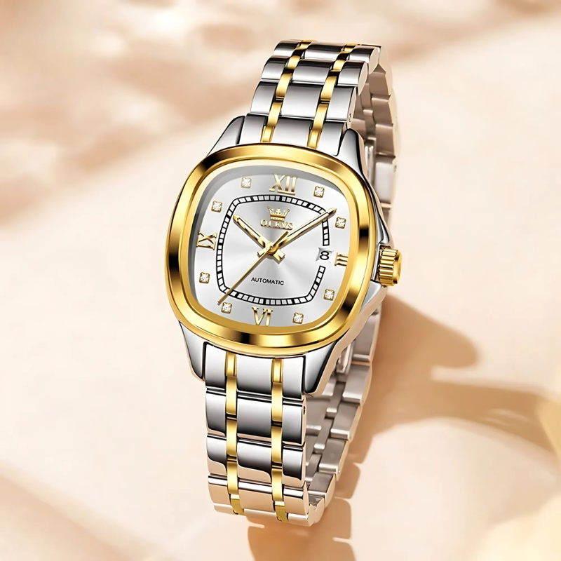 Montre Automatique Femme Bracelet Bicolore & Aiguilles Phosphorescentes sur fond couleur crème Image