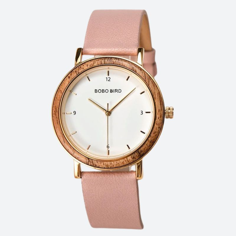 Montre Bois Femme Colorée au Cadran Minimaliste Doré couleur rose sur fond gris