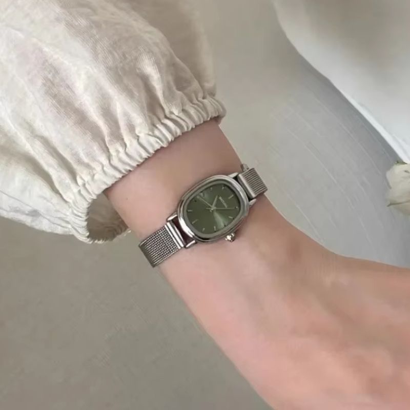 Montre Femme Ovale Acier Inoxydable Cadran Vert Minimaliste
