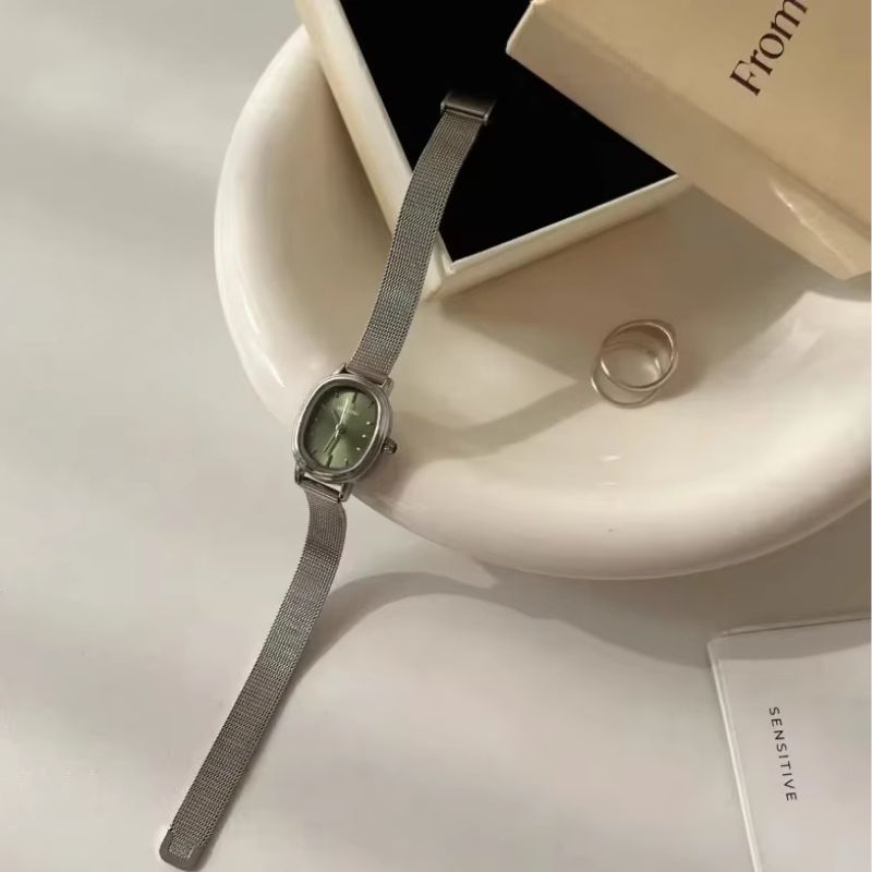 Montre Femme Ovale Acier Inoxydable Cadran Vert Minimaliste
