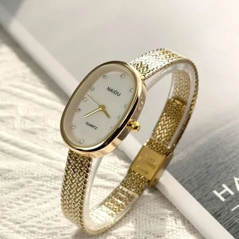 Montre Femme Ovale Dorée Acier Inoxydable Mini