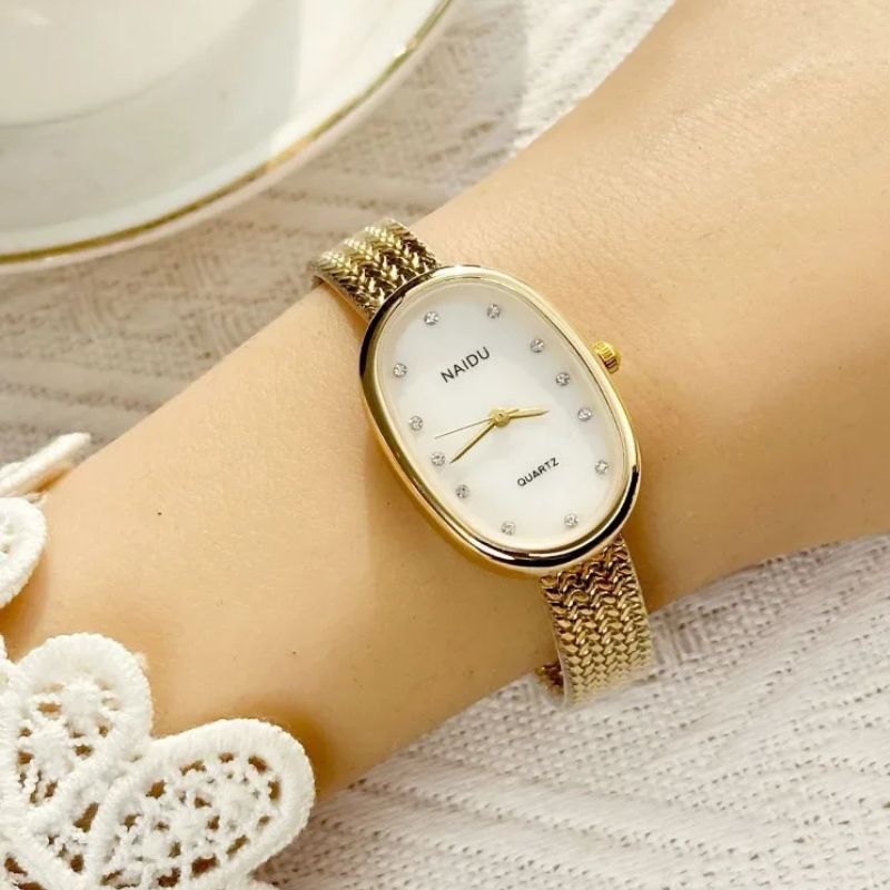 Montre Femme Ovale Dorée Acier Inoxydable Mini