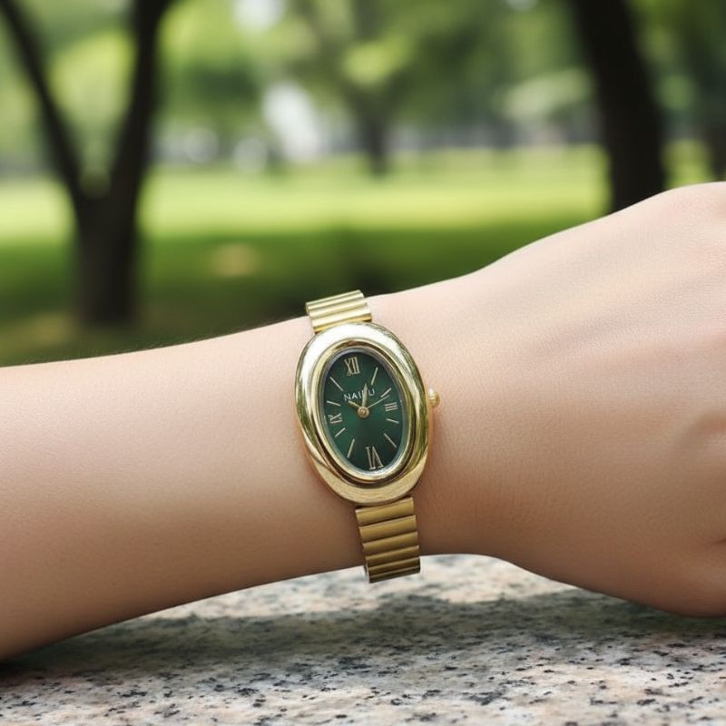 Montre Femme Ovale Dorée Bracelet Alliage Petit Cadran Quartz
