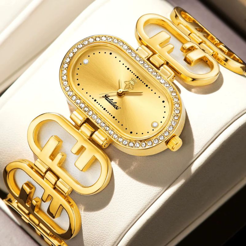 Montre Femme Ovale Dorée Bracelet Graphique Image
