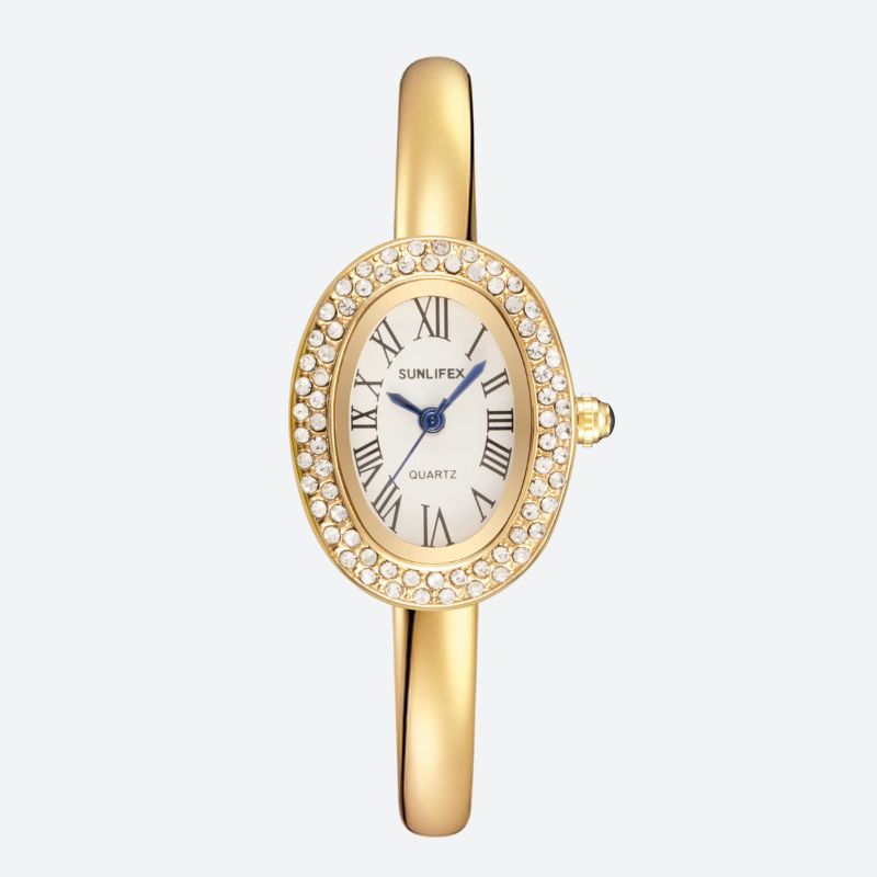 Montre Femme Ovale Dorée Strass Cadran Chiffres Romains Quartz