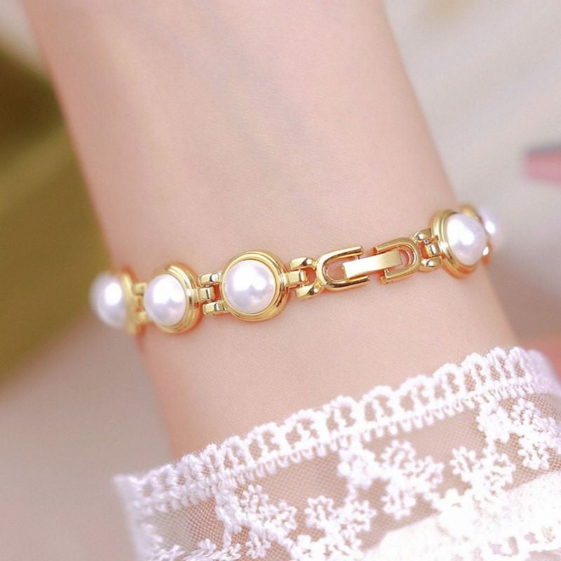 Montre Femme Quartz Perle Médiévale, Élégante Image