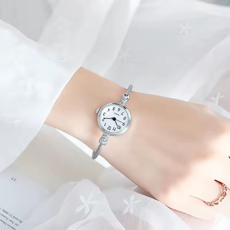 Montre Femme Quartz Rétro Ronde Acier