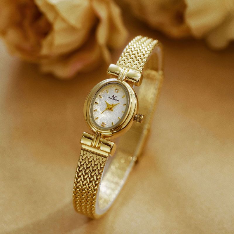 Montre Femme Élégante Quartz Petit Cadran Ovale et Bracelet Maille Tressée Image