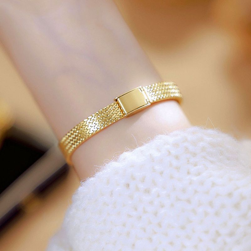 Montre Femme Élégante Quartz Petit Cadran Ovale et Bracelet Maille Tressée Image