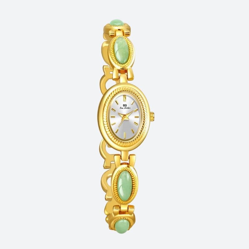 Montre Vintage Ovale pour Femme, boîtier doré avec strass et bracelet décoré de maillons ovales dorés et verts, cadran blanc à aiguilles dorées, style élégant et intemporel
