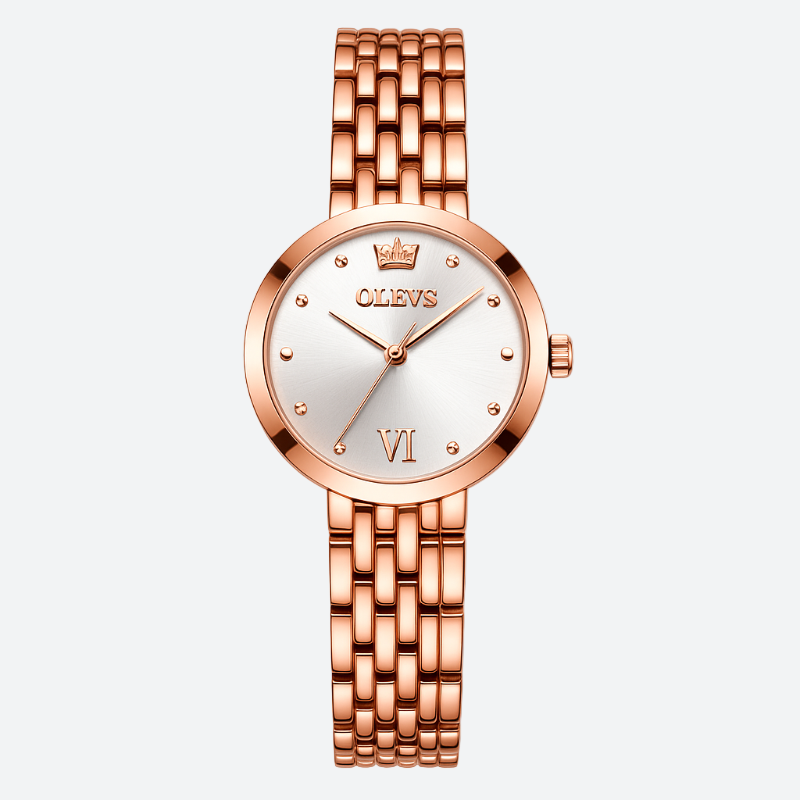 Montre Vintage de luxe pour Femme or rose, cadran argenté élégant et bracelet en acier poli.