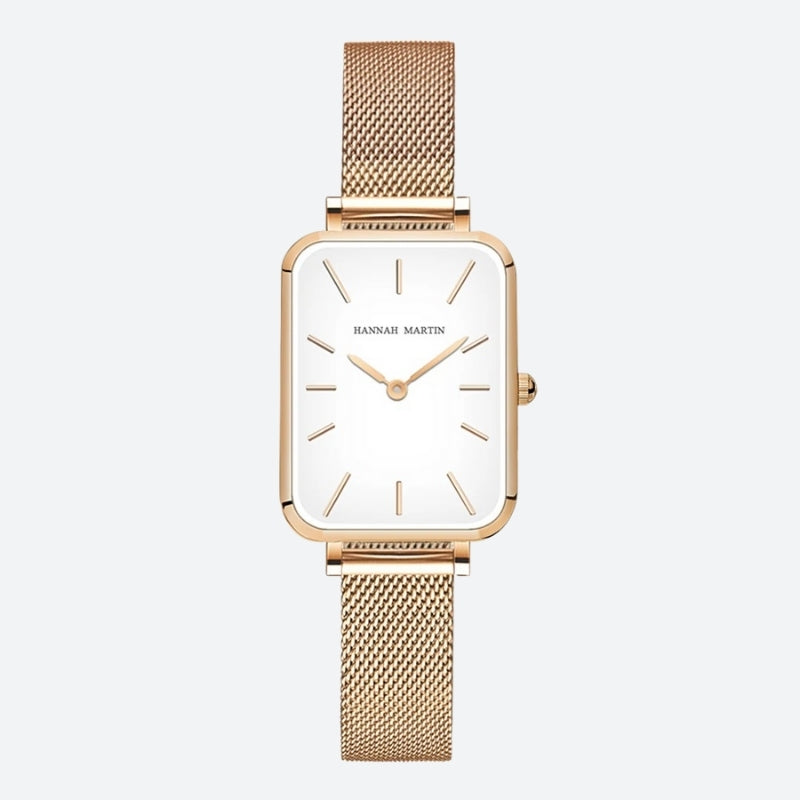 Montre Vintage pour Femme de forme rectangulaire dorée à maille fine, cadran blanc épuré et boîtier doré élégant.