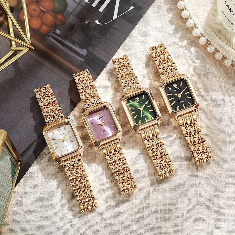 Montre_vintage_femme_rectangle_metal_doree_5 Image
