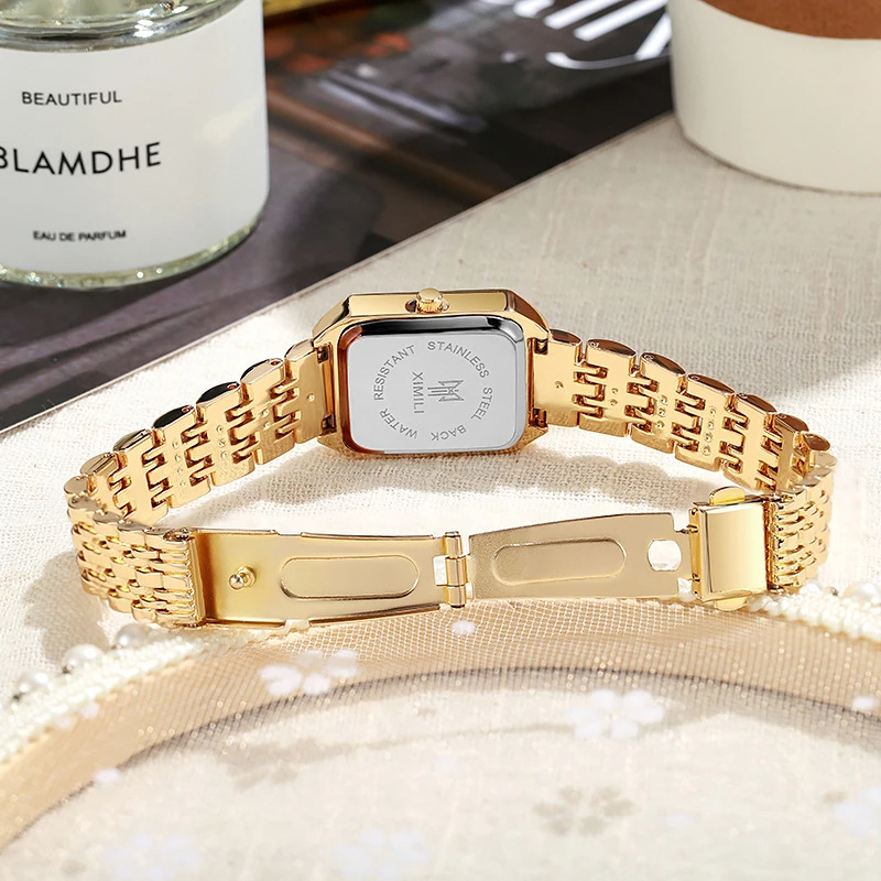 Montre_vintage_femme_rectangle_metal_doree_6 Image