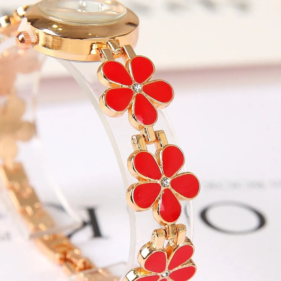 Montre Bracelet Fleur Femme à Cadran Rond et Finition Dorée
