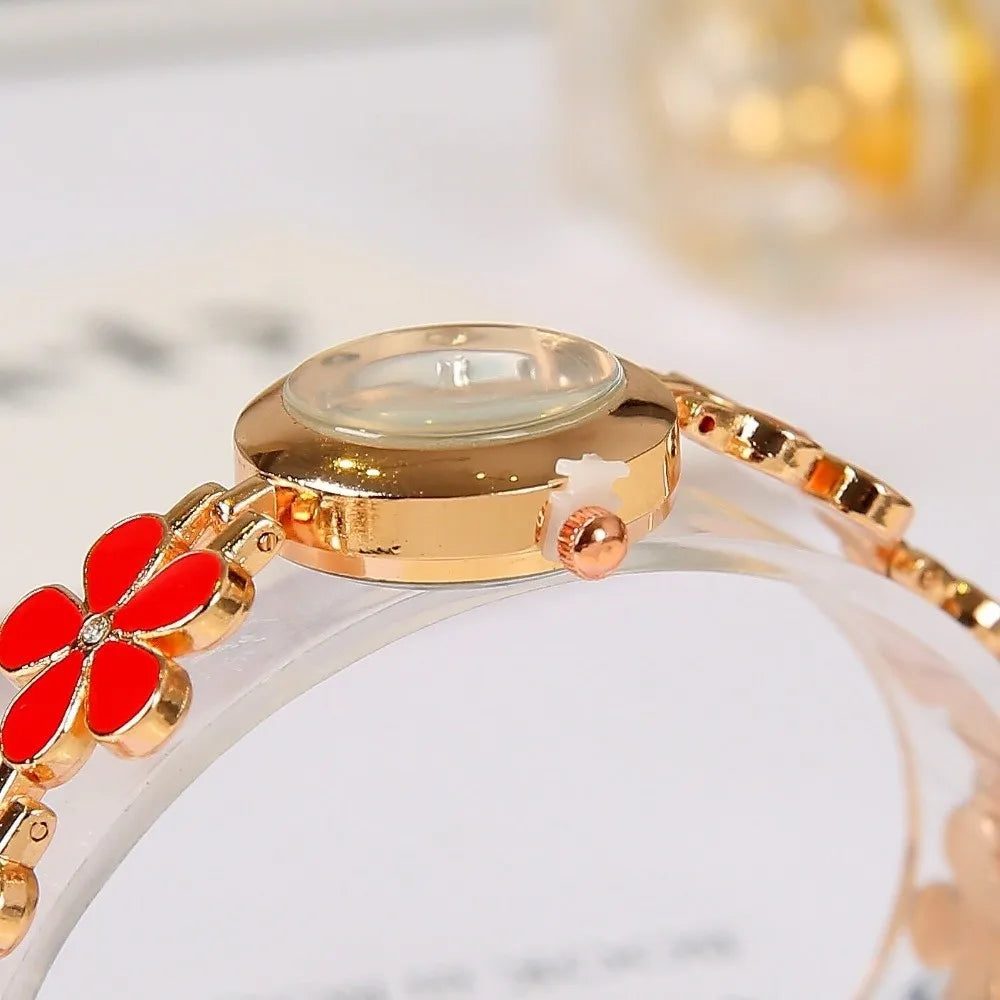 Montre Bracelet Fleur Femme à Cadran Rond et Finition Dorée