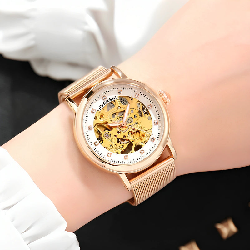 Montre squelette femme bracelet maille or rose