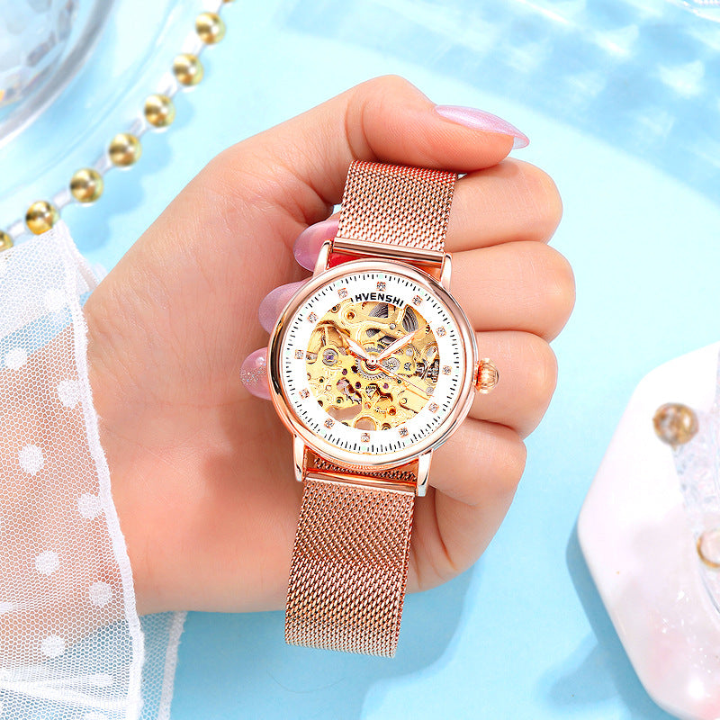 Montre squelette femme bracelet maille or rose