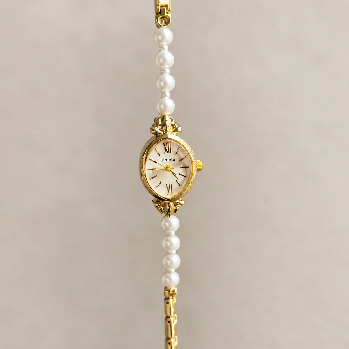 Montre Bracelet Perles à Cadran Oval et Chiffres Romains - Détail matière