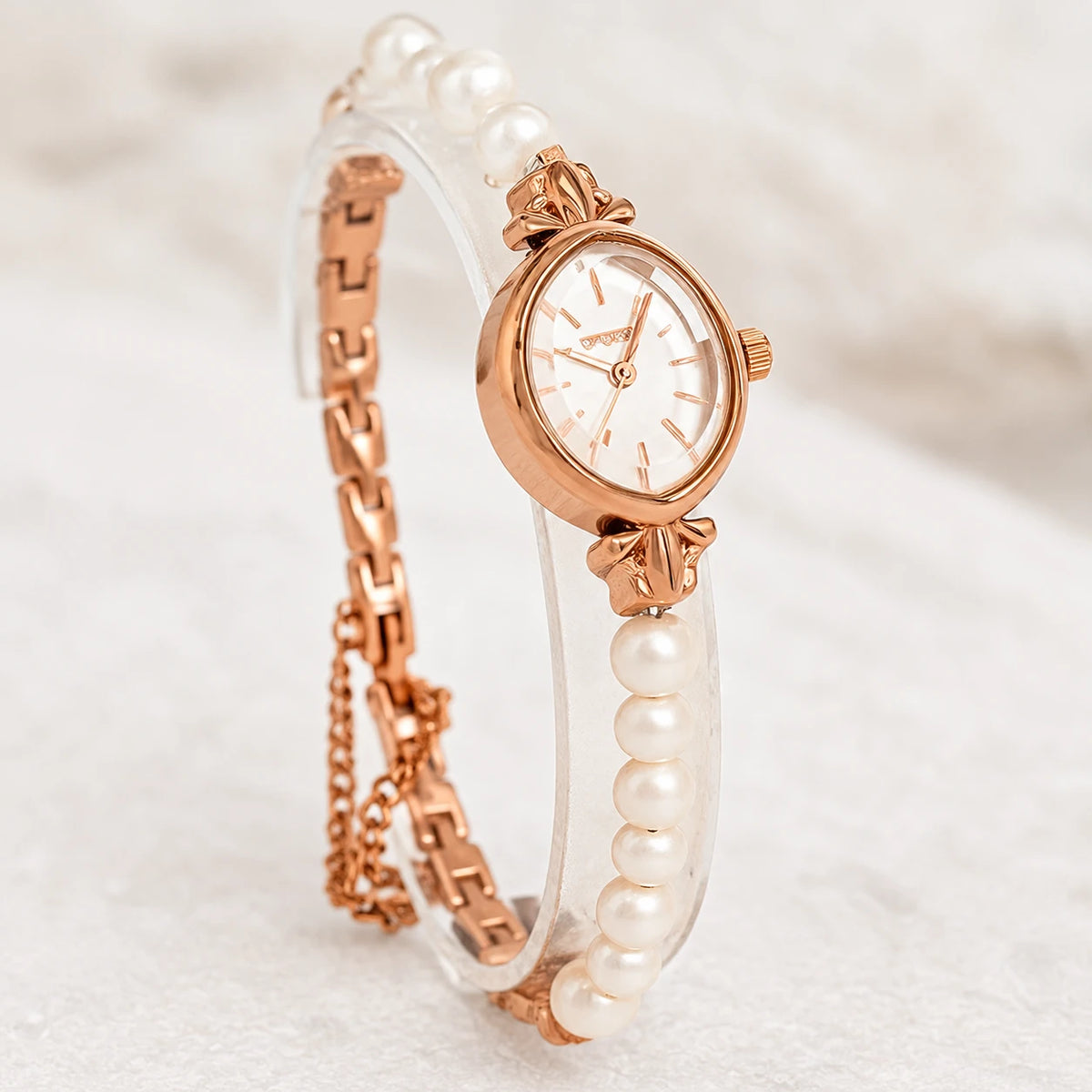 Montre femme bracelet perles et chaîne dorée rose - Détail matière
