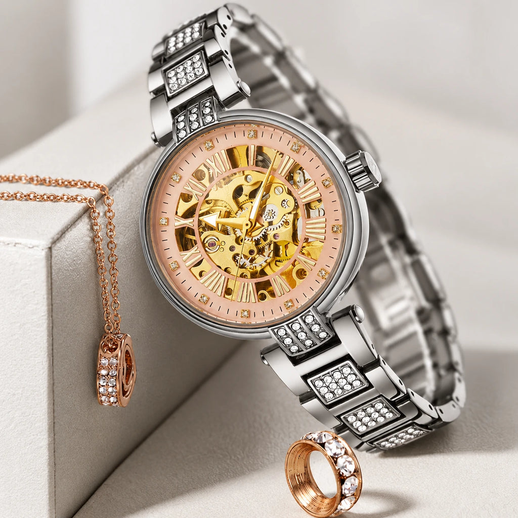 Montre Squelette Femme Mécanisme Apparent Bracelet Acier Orné - Détail matière