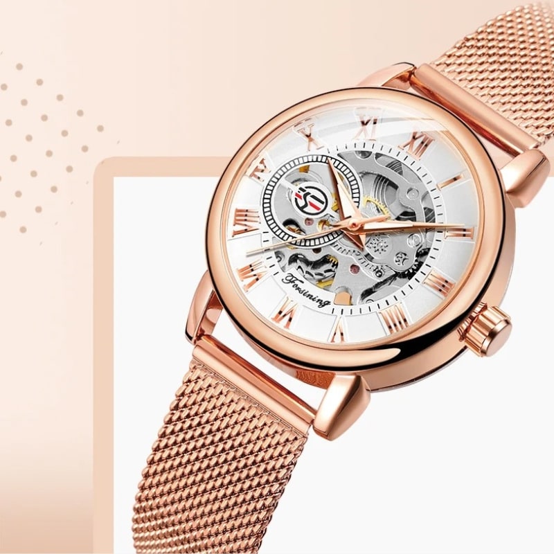 Montre Automatique Femme Bracelet Acier Maille & Cadran Ajouré en rose