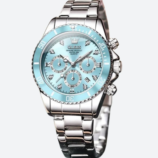 Montre chronographe femme cadran bleu glacier et acier miroir sur fond gris