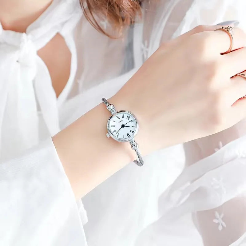 Montre Luxe Quartz Femme Jonc Torsadé Acier Style Vintage